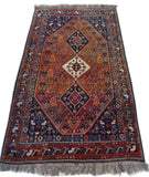 6'3" x 9'10"   Antique Persian Qashqai Rug Angle View