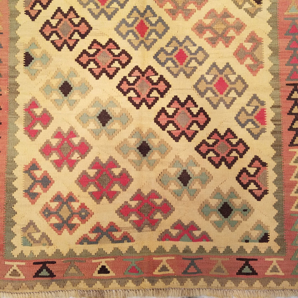 4'8" x 7'8"   Persian Vintage Qashqai Kilim Rug Angle View