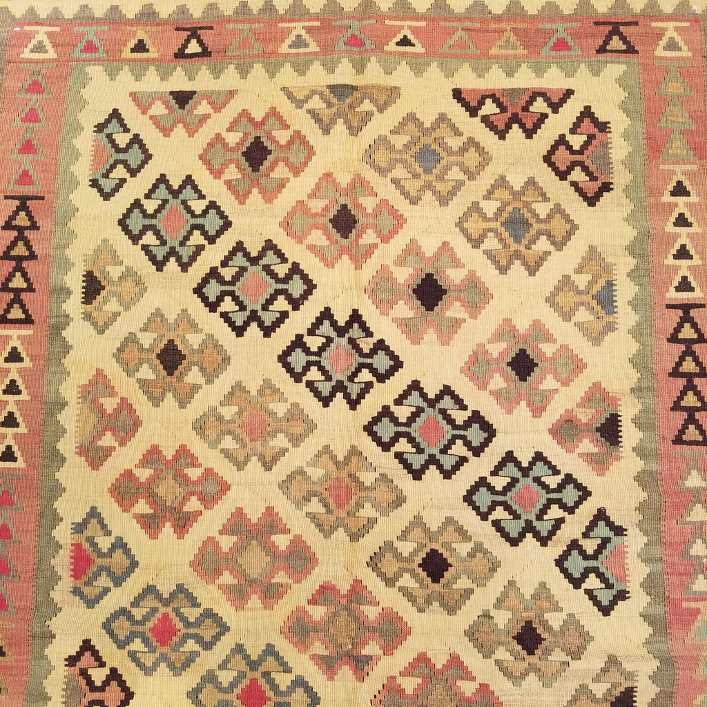 4'8" x 7'8"   Persian Vintage Qashqai Kilim Rug Angle View