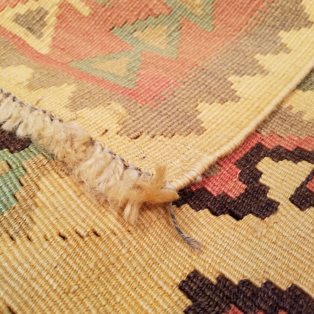 4'8" x 7'8"   Persian Vintage Qashqai Kilim Rug Angle View