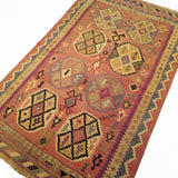 4'4" x 7'2"   Persian Vintage Qashqai Kilim Rug Angle View