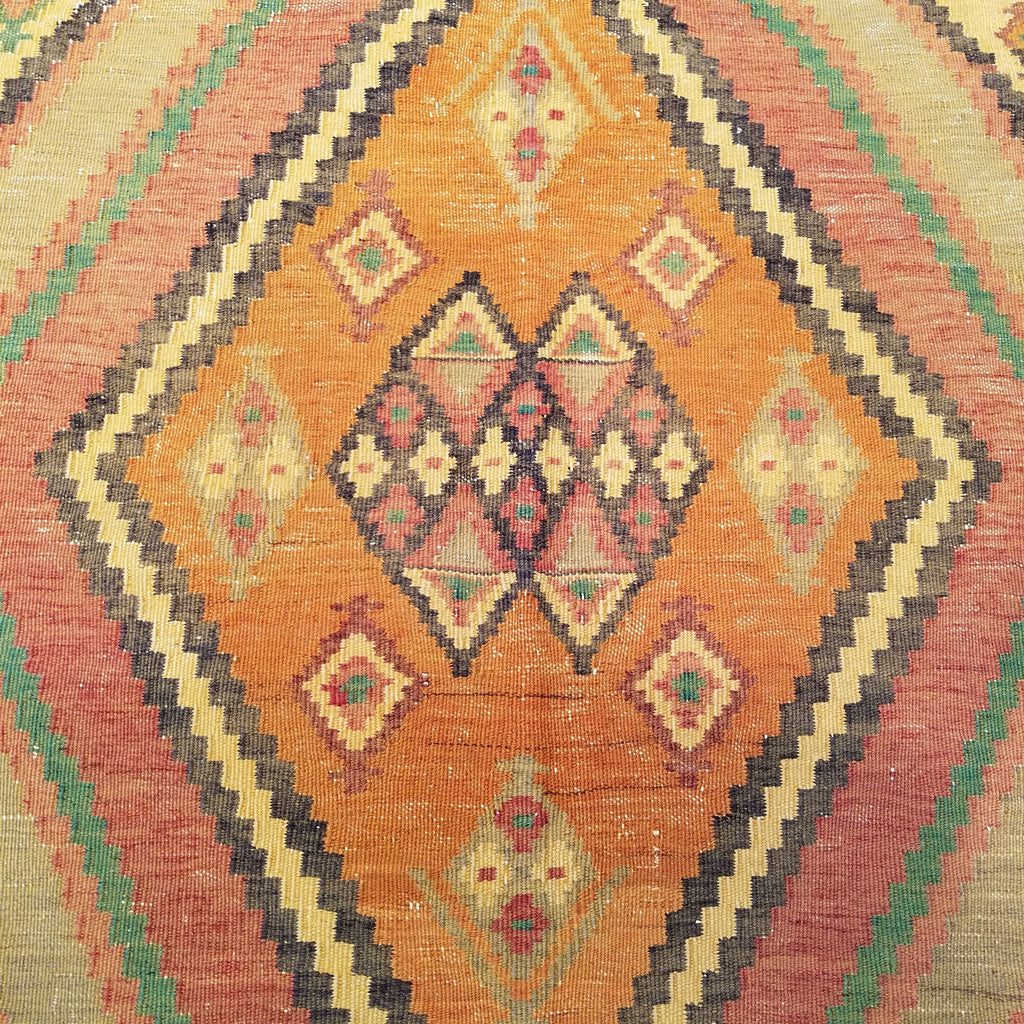 5'7" x 7'4"   Persian Vintage Qashqai Kilim Rug Angle View