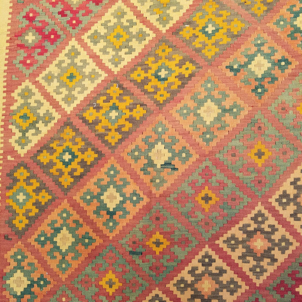 5'4" x 7'10"   Persian Vintage Qashqai Kilim Rug Angle View