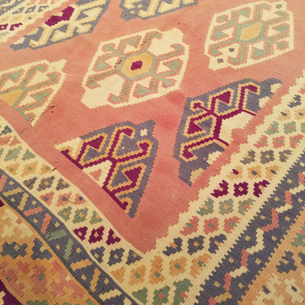 5'1" x 9'2"   Persian Vintage Qashqai Kilim Rug Angle View