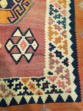 4'8" x 7'5"   Persian Vintage Qashqai Kilim Rug Angle View