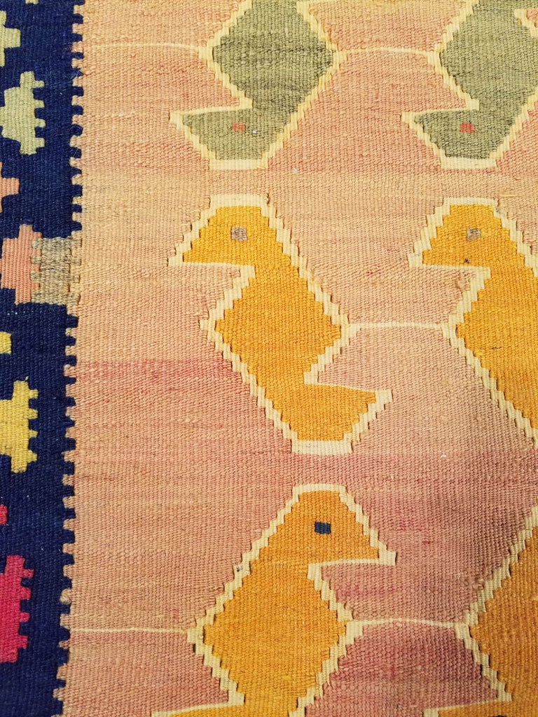 5'3" x 8'1"   Persian Vintage Qashqai Kilim Rug Angle View