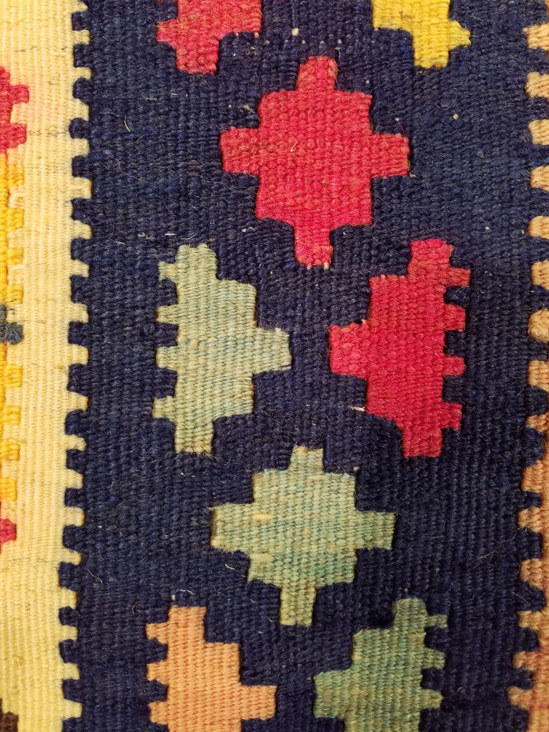 5'3" x 8'1"   Persian Vintage Qashqai Kilim Rug Angle View
