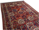 7'3" x 10'0"   Antique Persian Bakhtiar Garden of Eden Rug Angle View