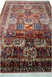 7'3" x 10'0"   Antique Persian Bakhtiar Garden of Eden Rug Angle View