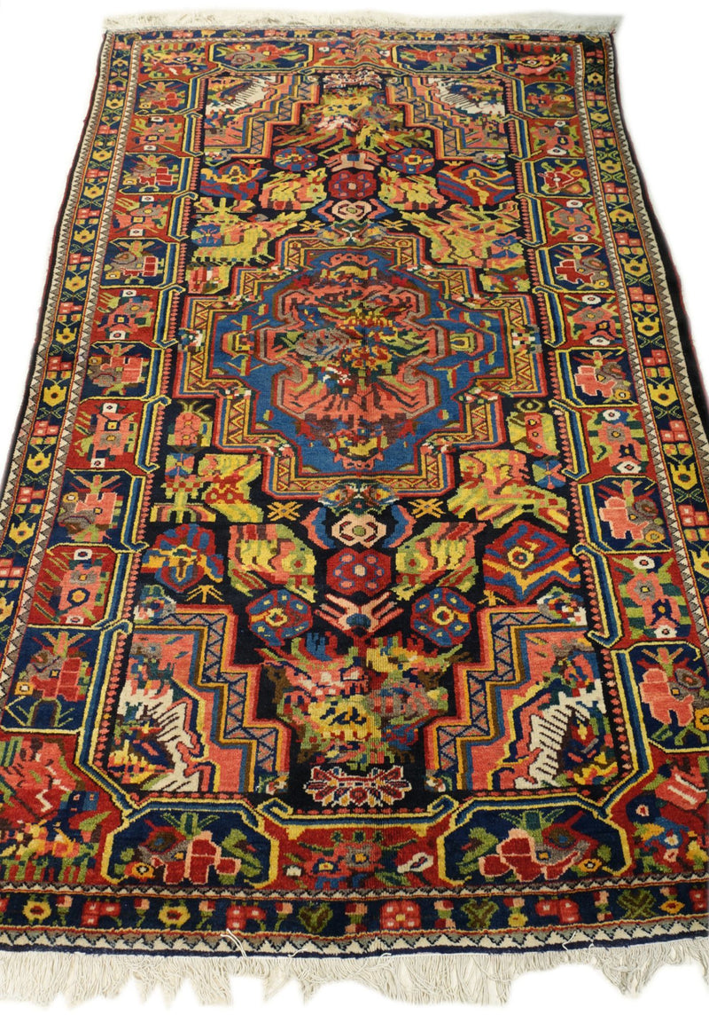 5'4" x 8'6"   Antique Persian Southern Bakhtiar Rug Angle View