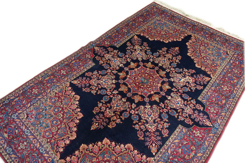 4'9" x 7'5"   Antique Persian East Iran Semnan Rug Angle View