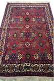 5'0" x 7'0"   Antique Persian Veramin Rug Angle View