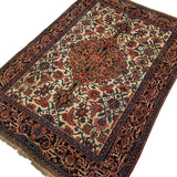 4'5" x 6'3"   Antique Persian Bakhtiar Rug Angle View
