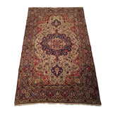 4'10" x 7'9"   Antique Persian Kerman Rug Angle View