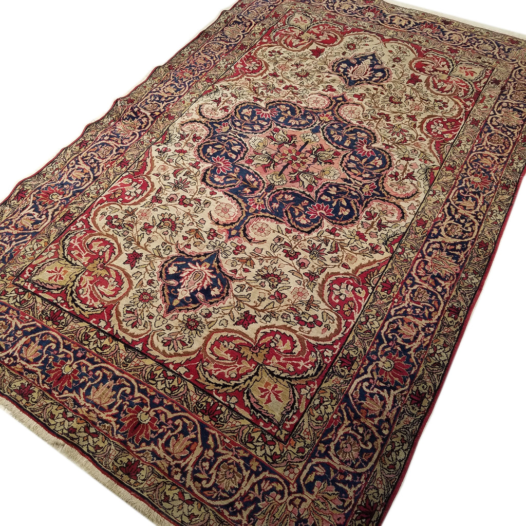 4'10" x 7'9"   Antique Persian Kerman Rug Angle View