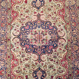 4'10" x 7'9"   Antique Persian Kerman Rug Angle View