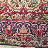 4'10" x 7'9"   Antique Persian Kerman Rug Angle View