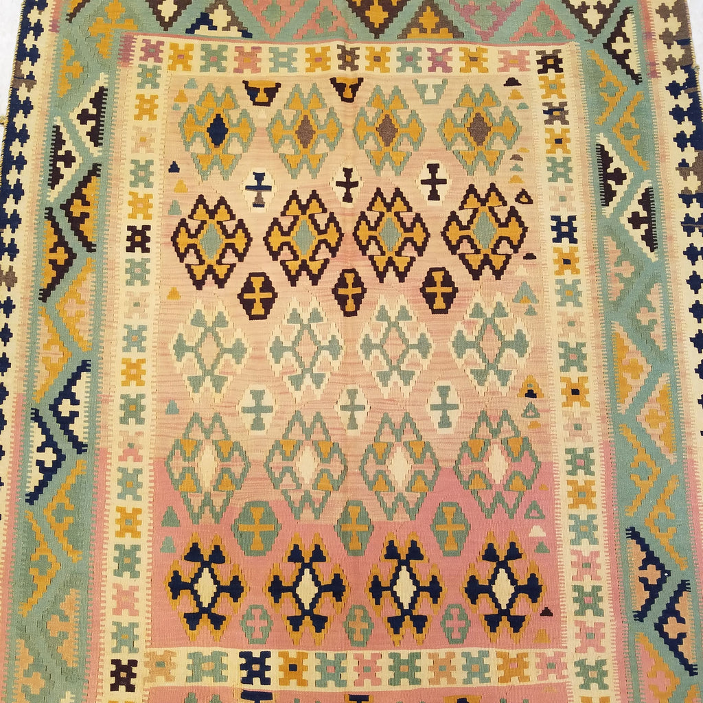 4'8" x 9'0"   Persian Vintage Qashqai Kilim Rug Angle View