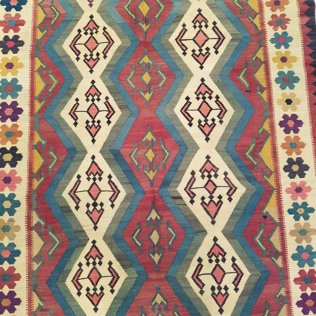 5'1" x 7'7"   Persian Vintage Qashqai Kilim Rug Angle View
