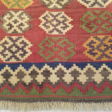 4'10" x 8'8"   Persian Vintage Qashqai Kilim Rug Angle View