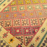 5'4" x 7'10"   Persian Vintage Qashqai Kilim Rug Angle View
