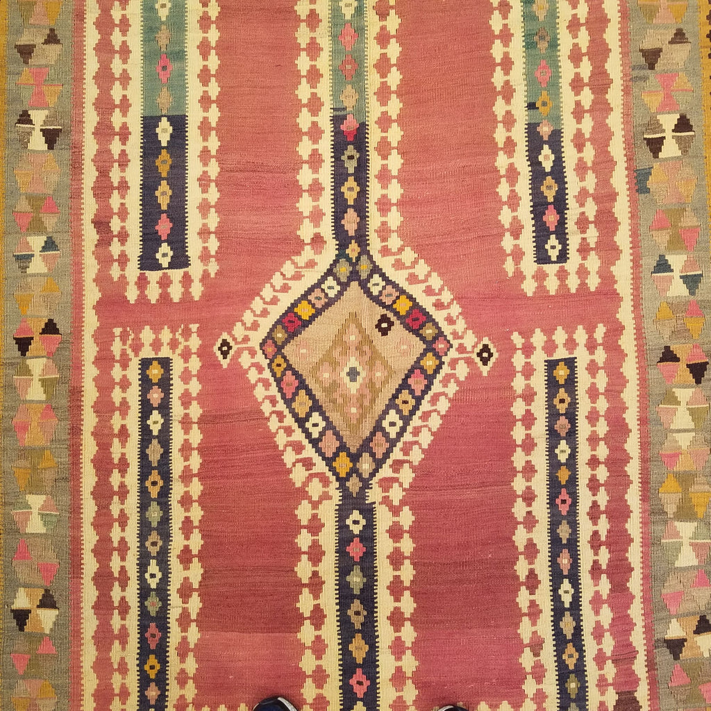 5'0" x 9'6"   Persian Vintage Qashqai Kilim Rug Angle View