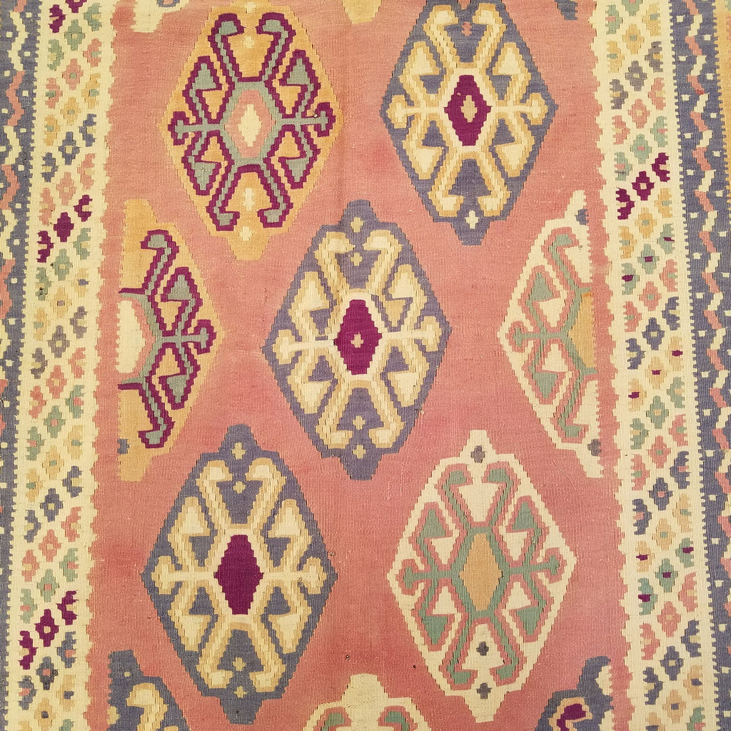 5'1" x 9'2"   Persian Vintage Qashqai Kilim Rug Angle View
