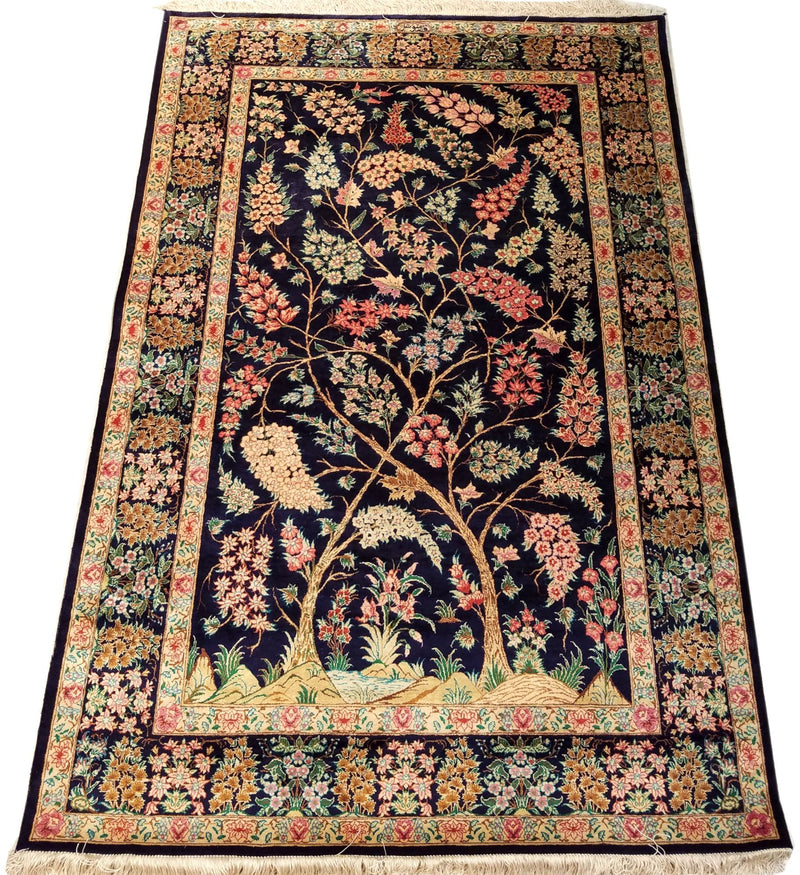 4'5" x 6'5"   Silk Persian Qom Tree of Life Rug Angle View