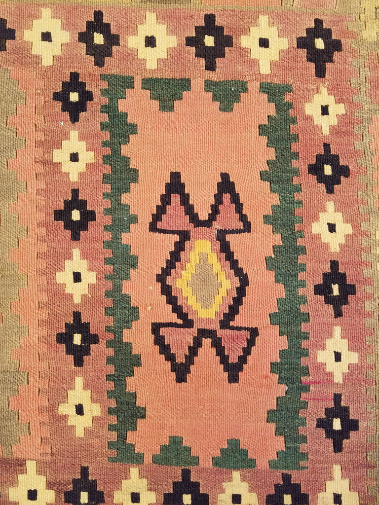 4'6" x 7'11"   Persian Vintage Qashqai Kilim Rug Angle View