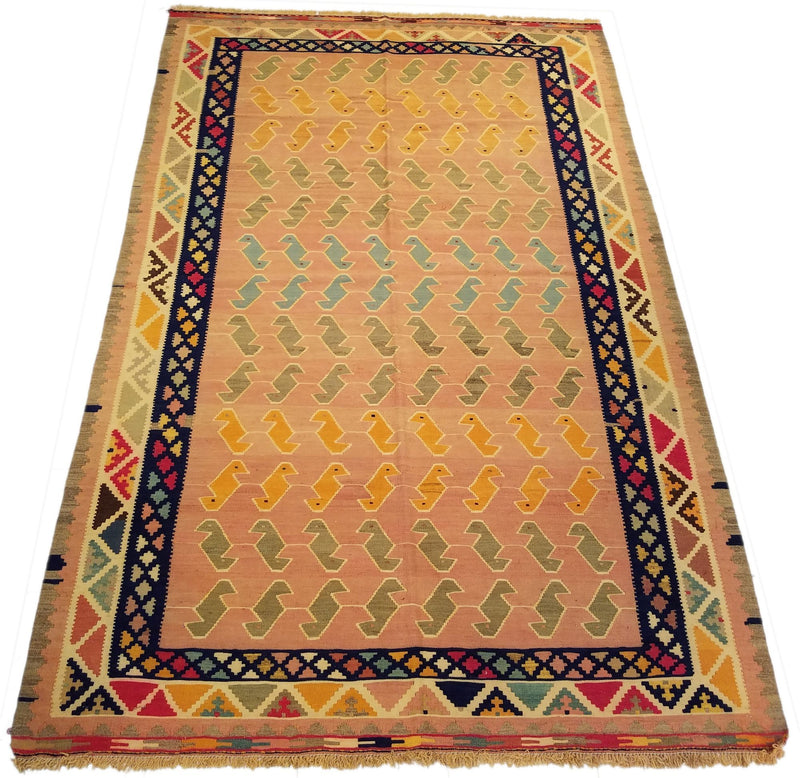 5'3" x 8'1"   Persian Vintage Qashqai Kilim Rug Angle View