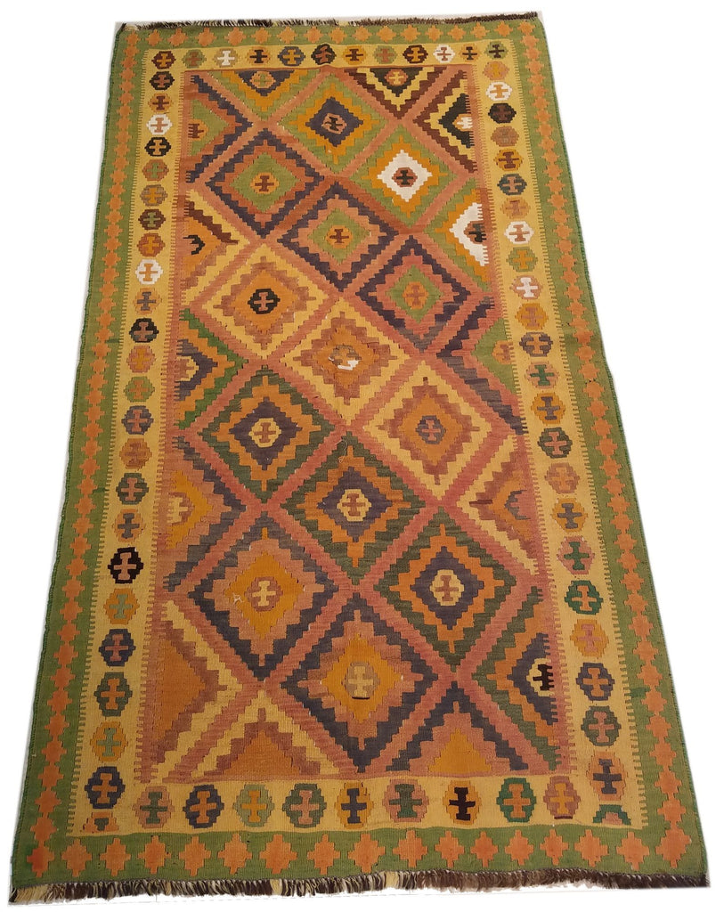 4'9" x 8'5"   Persian Vintage Qashqai Kilim Rug Angle View