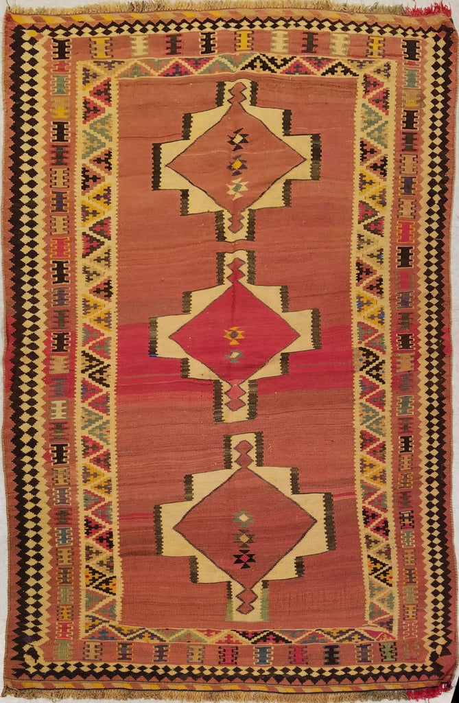 4'9" x 7'4"   Persian Vintage Qashqai Kilim Rug Angle View