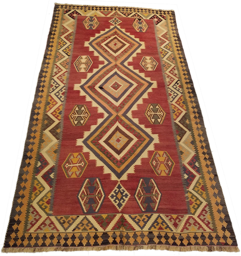 5'1" x 8'9"   Persian Vintage Qashqai Kilim Rug Angle View