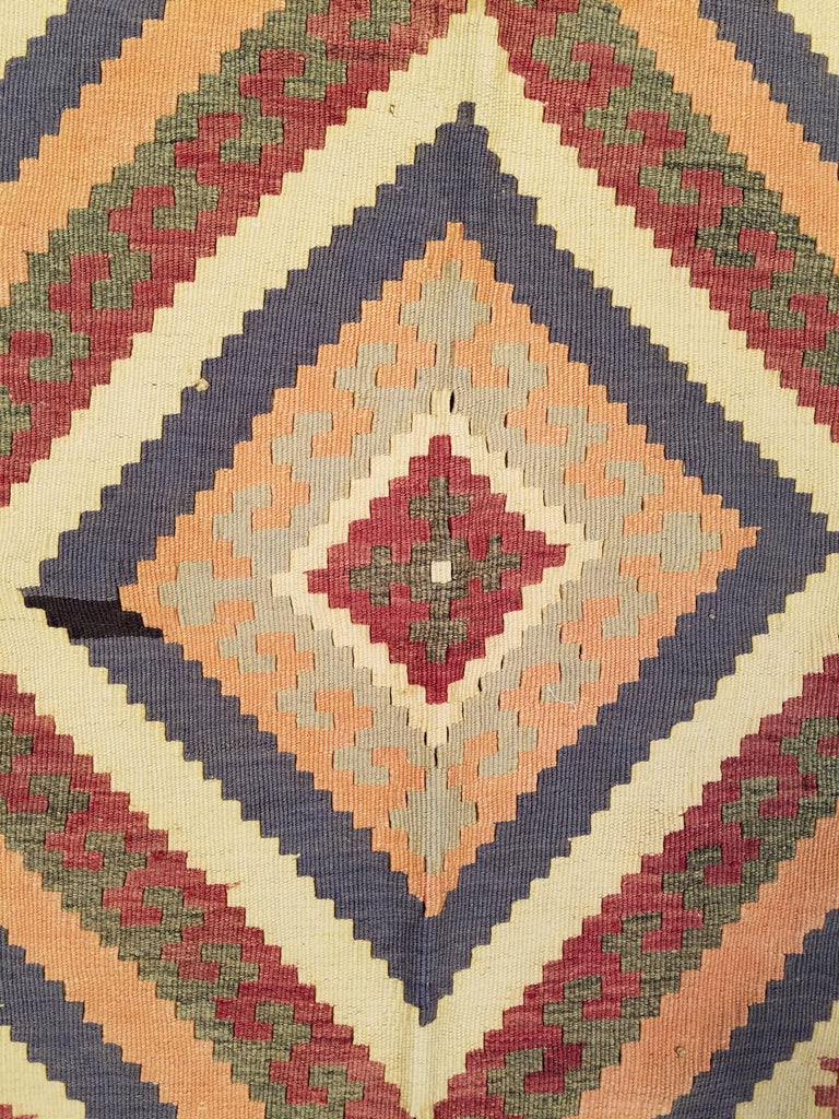 5'1" x 8'9"   Persian Vintage Qashqai Kilim Rug Angle View